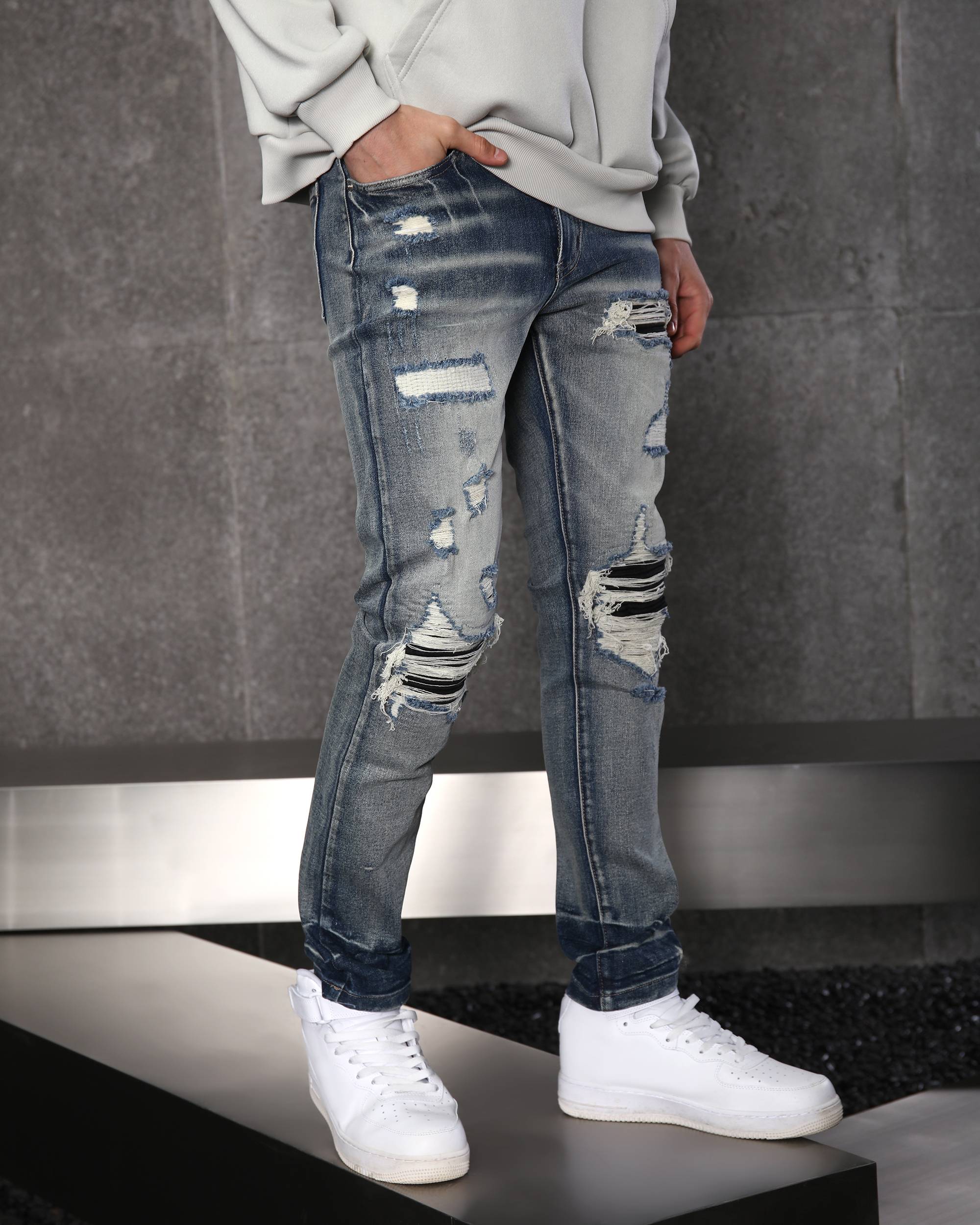 Men’s Streetwear Blue Ripped & Distressed Jeans with Black Patches
