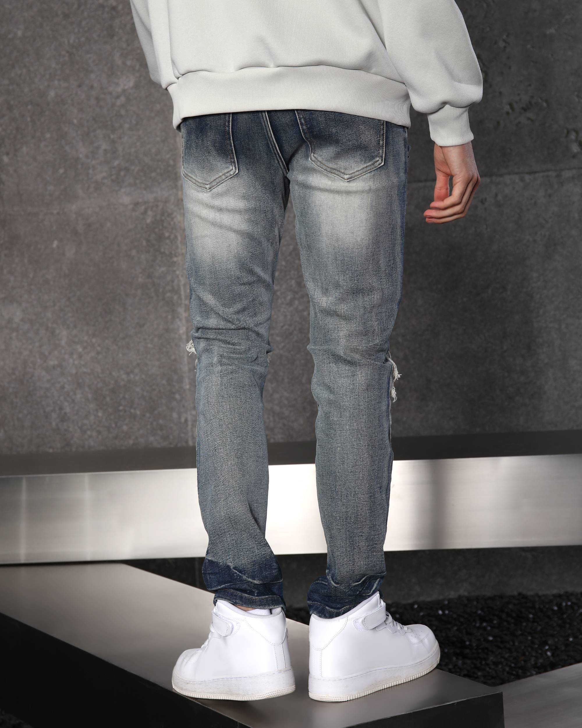 Men’s Streetwear Blue Ripped & Distressed Jeans with Black Patches
