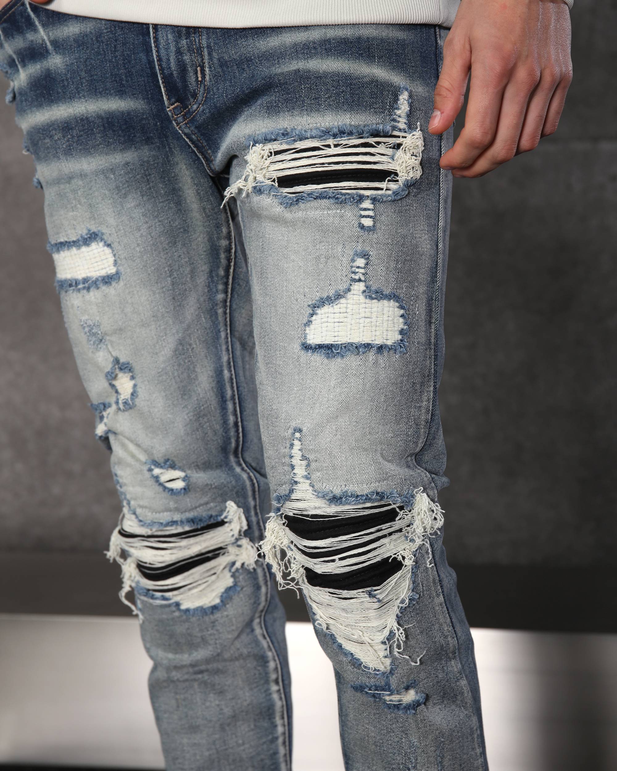 Men’s Streetwear Blue Ripped & Distressed Jeans with Black Patches